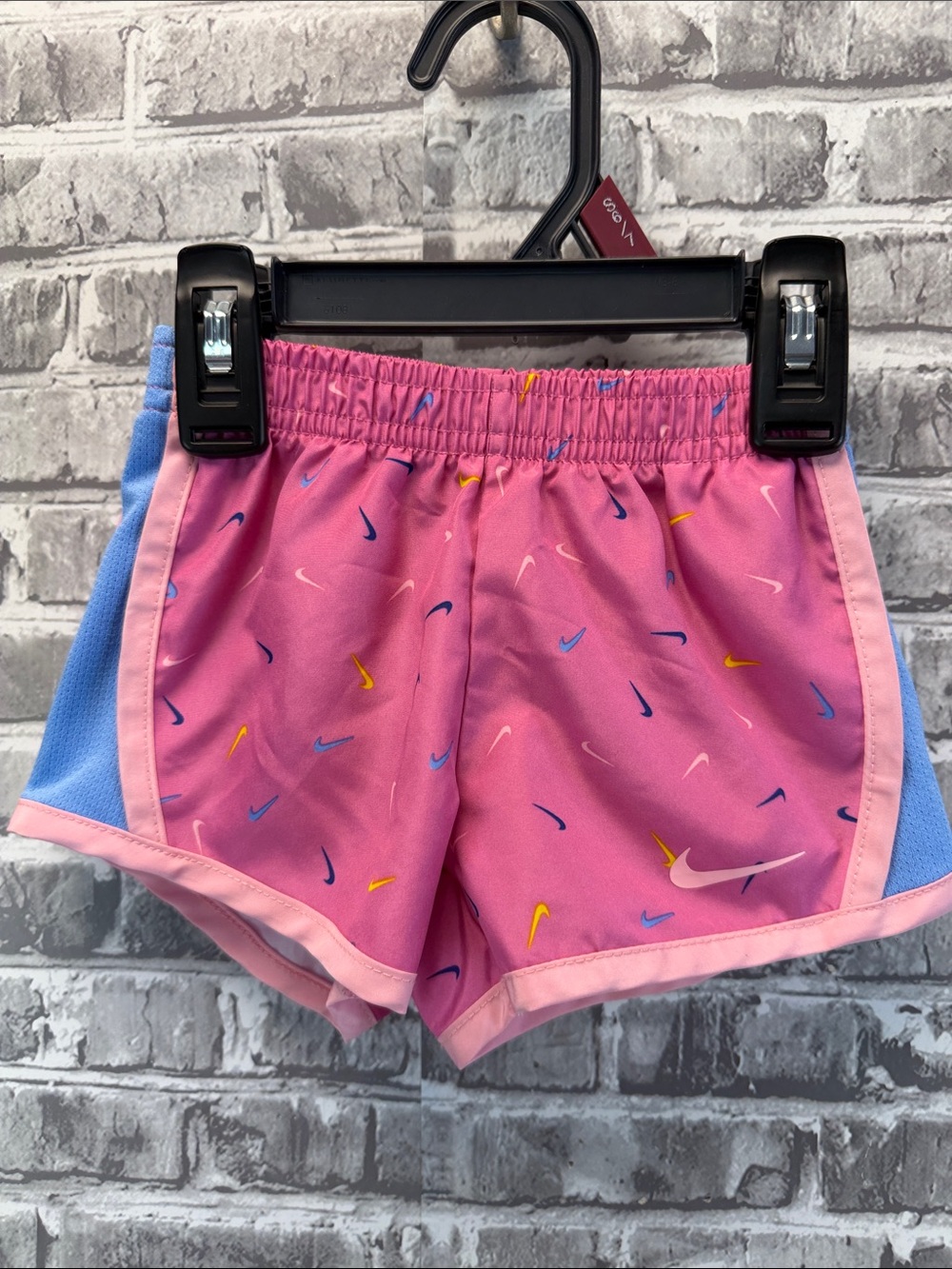 Nike Pink Girls' Shorts with Blue Panels and Multi-Color Swooshes